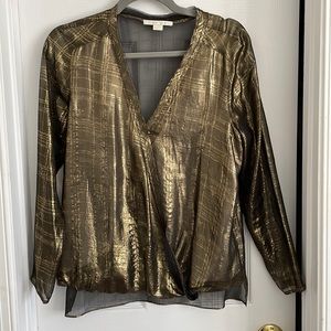 Woman’s gold top